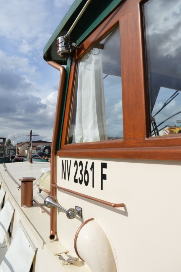 Gold coloured 'down-pipe' to carry the water from the wheelhouse roof down to our water tanks (where lock is)