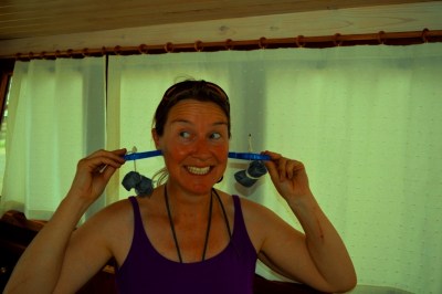 Crazy women with ear-rings - or ARE THEY ear-rings?