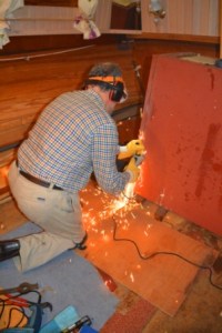 Noel cutting 'bits' off -making a waste tank from old water tank.